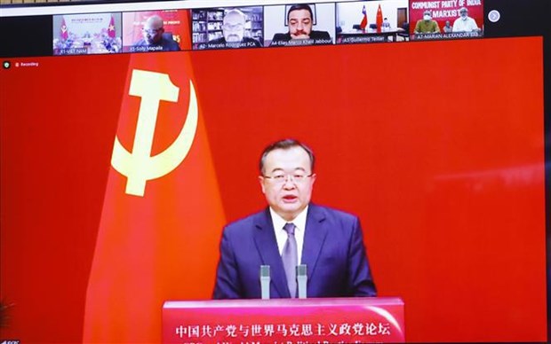 Le leader vietnamien felicite le Forum entre le PCC et les partis politiques maxistes du monde hinh anh 2