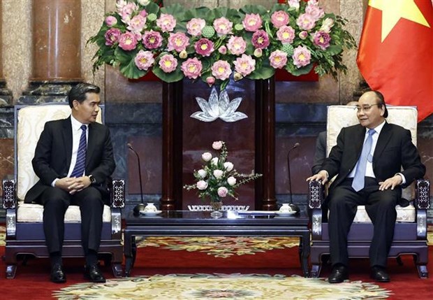 Le president Nguyen Xuan Phuc recoit le president du Parquet populaire supreme du Laos hinh anh 1