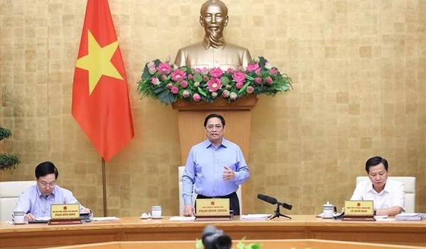 Le PM Pham Minh Chinh preside la reunion periodique du gouvernement sur l'edification de la loi hinh anh 1