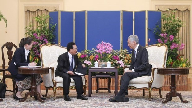 Singapour et le Laos renforcent leur cooperation dans les domaines emergents hinh anh 1