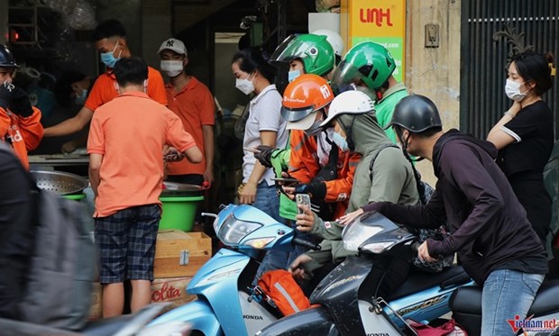 Les Vietnamiens sont "accros" a la commande de nourriture et aux achats en ligne hinh anh 1