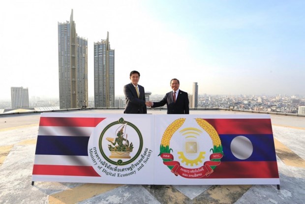 La Thailande et le Laos renforcent leur cooperation dans la poste et le numerique hinh anh 1