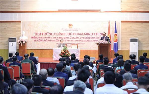 Le PM Pham Minh Chinh rencontre des expatries vietnamiens au Cambodge hinh anh 1
