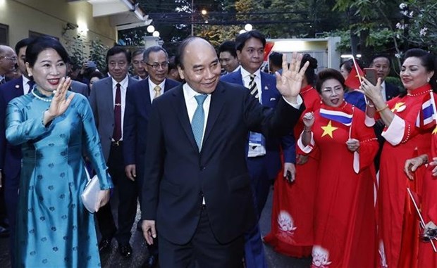 Le president Nguyen Xuan Phuc rencontre des Vietnamiens en Thailande hinh anh 1