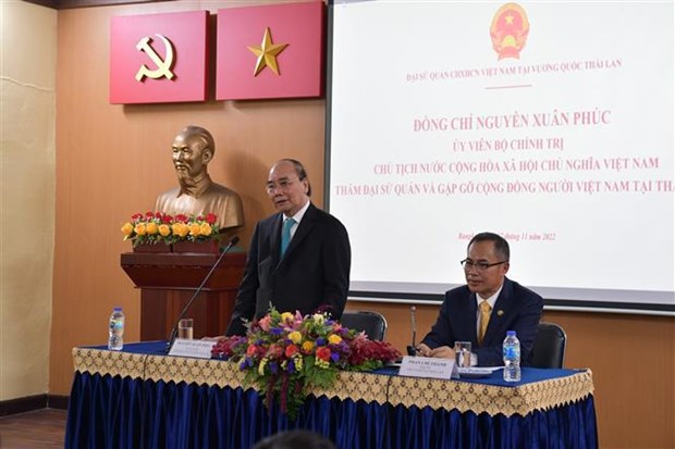 Le president Nguyen Xuan Phuc rencontre des Vietnamiens en Thailande hinh anh 2