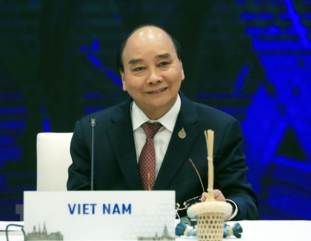 Le president vietnamien assiste au dialogue entre les dirigeants de l’APEC et les invites hinh anh 1