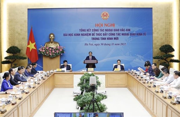Le PM Pham Minh Chinh a la conference bilan sur la diplomatie vaccinale hinh anh 1