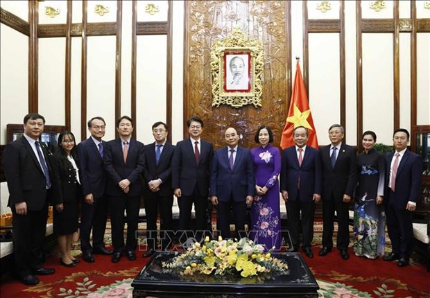 Le president Nguyen Xuan Phuc salue la cooperation entre la VNA et Yonhap hinh anh 2