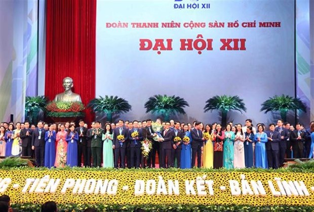 Les jeunes vietnamiens et lao fetent le succes du 12e Congres de l’UJCH hinh anh 1