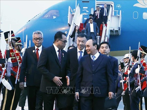 Le president Nguyen Xuan Phuc arrive a Jakarta pour sa visite d’Etat en Indonesie hinh anh 1