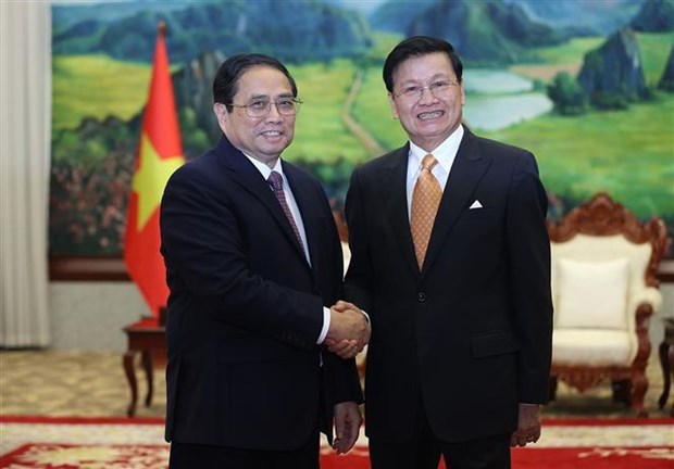 Le PM Pham Minh Chinh rencontre le secretaire general du Parti et president du Laos hinh anh 1