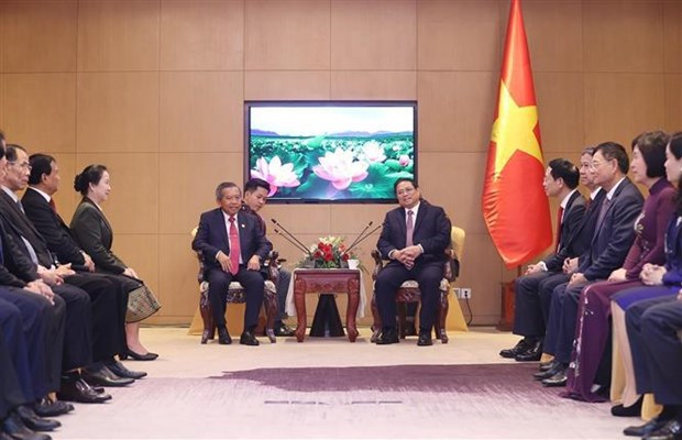 Le PM Pham Minh Chinh recoit le president de l'Association d'amitie Laos - Vietnam hinh anh 1