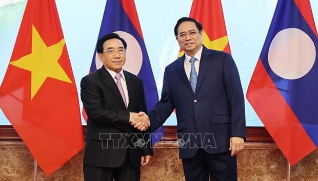 La visite du Premier ministre au Laos conclut l’Annee de la solidarite et de l’amitie 2022 hinh anh 1