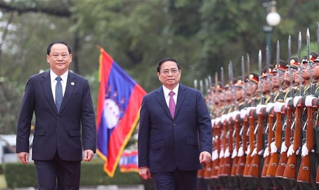 Le Premier ministre Pham Minh Chinh entame sa visite officielle au Laos hinh anh 3