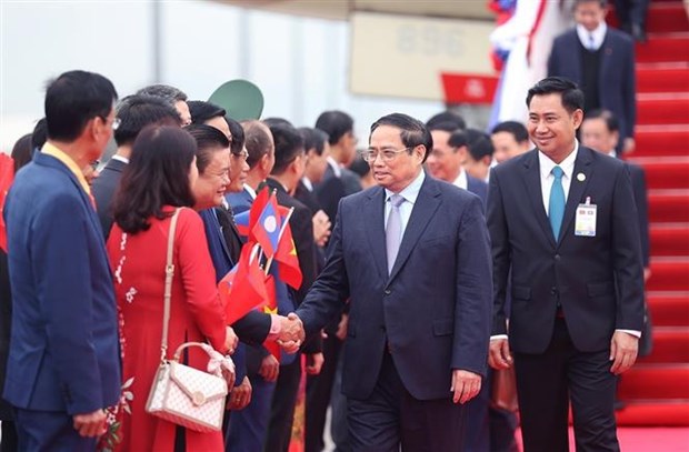 Le Premier ministre Pham Minh Chinh entame sa visite officielle au Laos hinh anh 2