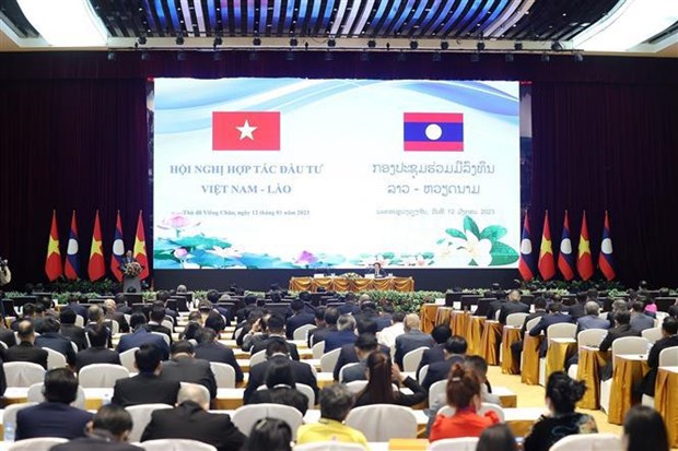 Le Vietnam et le Laos cherchent a favoriser les investissements bilateraux hinh anh 1