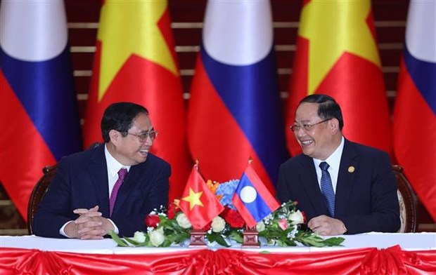 Le Premier ministre Pham Minh Chinh termine sa visite officielle au Laos hinh anh 2