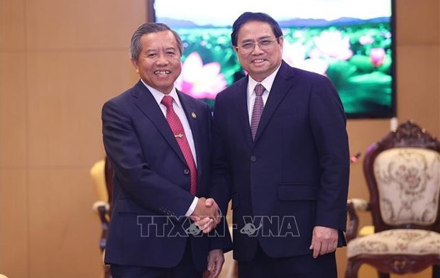 Le president de l'Association d'amitie Laos - Vietnam apprecie la visite du PM Pham Minh Chinh hinh anh 1