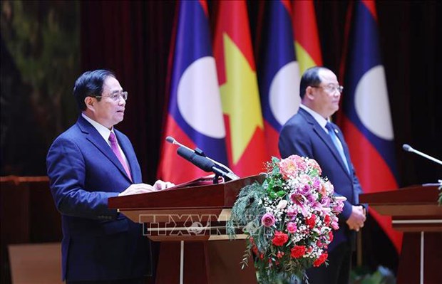 Le president de l'Association d'amitie Laos - Vietnam apprecie la visite du PM Pham Minh Chinh hinh anh 2