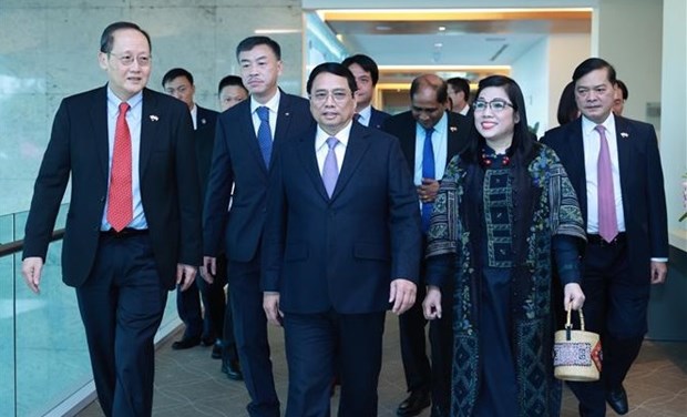 Le Premier ministre Pham Minh Chinh entame sa visite officielle a Singapour hinh anh 1