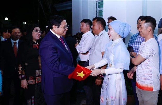 Le Premier ministre rencontre des Vietnamiens au Brunei hinh anh 2