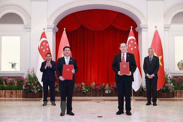 La visite du PM Pham Minh Chinh va impulser les liens economiques Vietnam-Singapour hinh anh 2