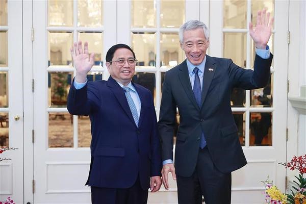 La visite du PM Pham Minh Chinh a Singapour a apporte des resultats concrets aux deux parties hinh anh 1