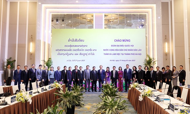 Hanoi partage ses experiences avec des parlementaires lao hinh anh 1