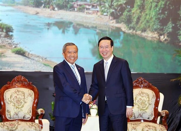 Le president Vo Van Thuong salue des relations speciales Vietnam-Laos hinh anh 2
