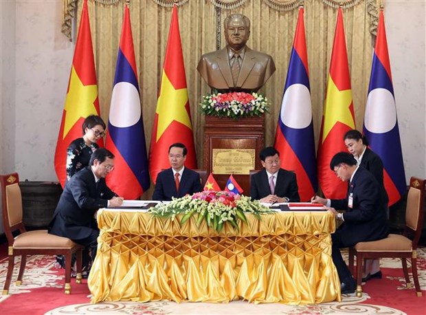 Le president Vo Van Thuong termine avec succes sa visite officielle au Laos hinh anh 2
