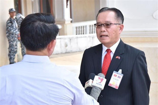 La visite officielle au Laos du president Vo Van Thuong a ete "un grand succes" hinh anh 2