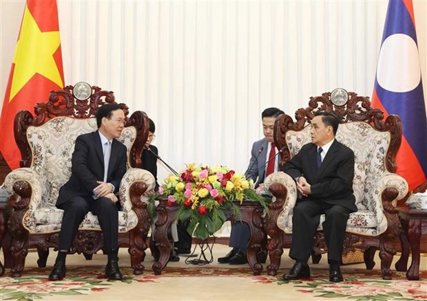 Le president vietnamien rencontre d'anciens hauts dirigeants lao hinh anh 2