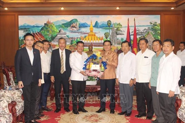 Le consulat general du Vietnam a Champassak felicite le Nouvel An traditionnel lao hinh anh 1