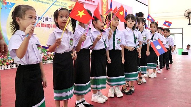 La diaspora fiere des acquis du Vietnam et des relations speciales avec le Laos hinh anh 3