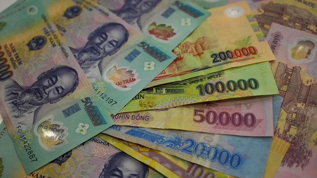 La position de la monnaie vietnamienne continue de se renforcer hinh anh 1