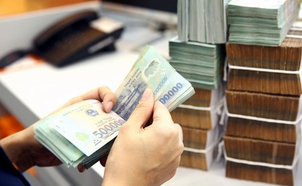 Le salaire de base augmentera a 1,8 million de dongs/mois a partir du juillet hinh anh 1