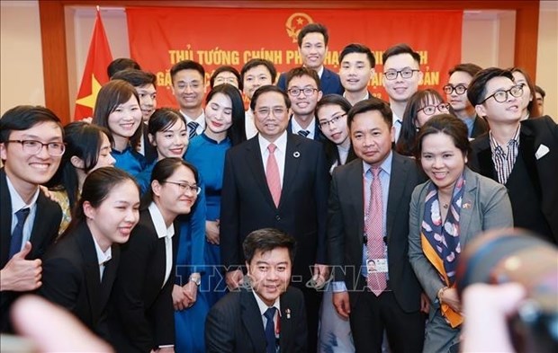 Le Premier ministre Pham Minh Chinh rencontre des Vietnamiens au Japon hinh anh 1