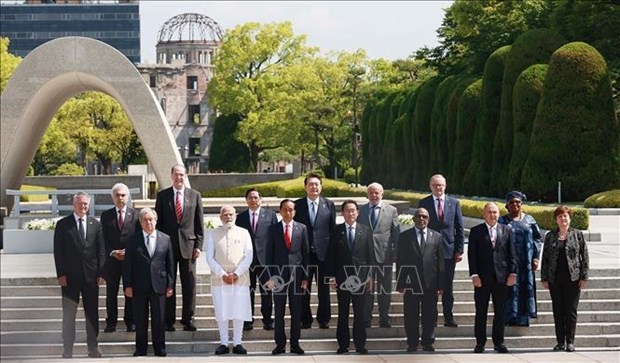 Le Premier ministre Pham Minh Chinh poursuit ses activites a Hiroshima hinh anh 2