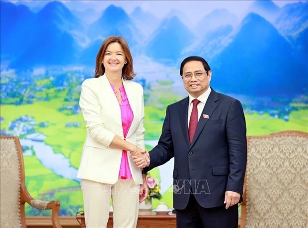 Le PM Pham Minh Chinh recoit la vice-PM, ministre des AE et europeennes de Slovenie hinh anh 2