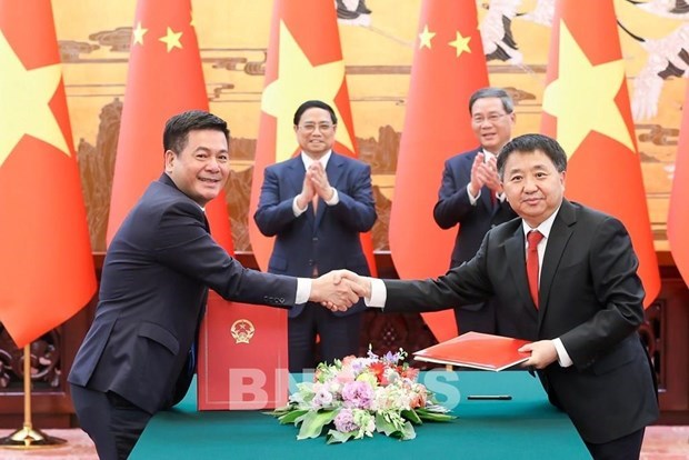 Le MoIT signe un protocole d’accord avec le regulateur du marche chinois hinh anh 1