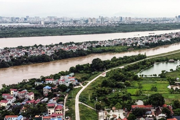 Hanoi voit grand et loin sur les rives du fleuve Rouge hinh anh 3