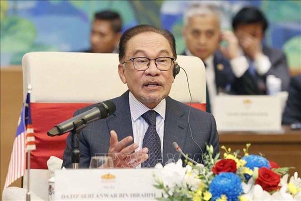 Le processus de developpement du Vietnam est une bonne experience, selon le Premier ministre malaisien hinh anh 1