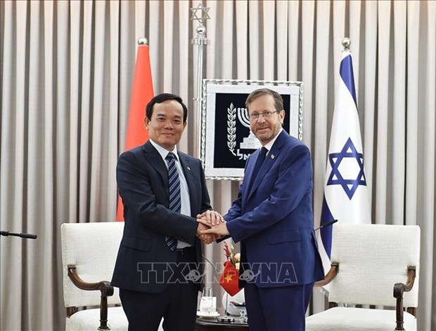 Le vice-PM Tran Luu Quang rencontre le president israelien Isaac Herzog hinh anh 1