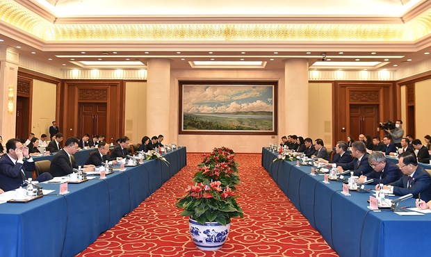 Le vice-PM Tran Luu Quang recoit le secretaire du Comite provincial du Parti du Yunnan hinh anh 2