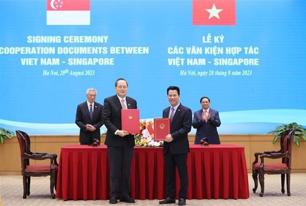 Le Vietnam et Singapour envisagent un partenariat strategique integral hinh anh 3