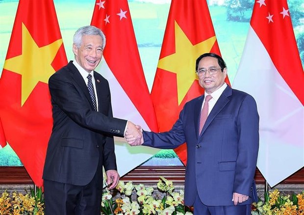 Le Vietnam et Singapour envisagent un partenariat strategique integral hinh anh 1
