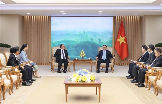 Le PM Pham Minh Chinh recoit le ministre lao du Plan et de l'Investissement hinh anh 2