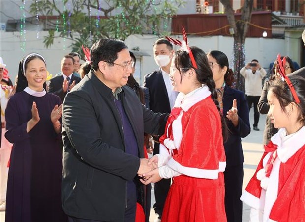 Le Premier ministre Pham Minh Chinh adresse ses vœux de Noel a Bac Giang hinh anh 1