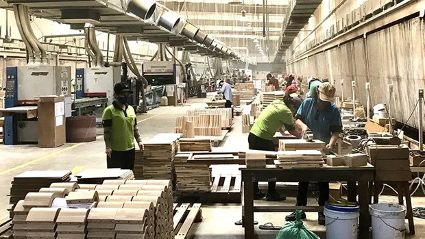 Renforcement des liens entre les entreprises nationales et d'IDE pour stimuler les exportations de bois hinh anh 1
