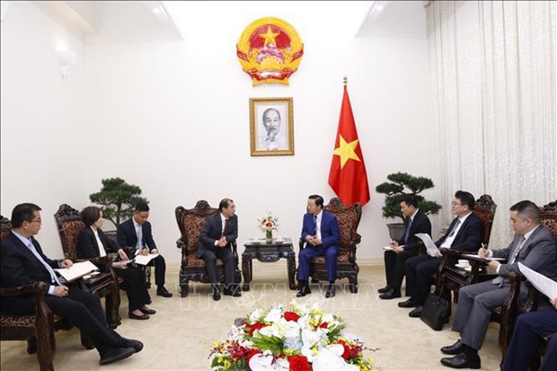 Le vice-Premier ministre Tran Hong Ha recoit un responsable de China Energy hinh anh 1